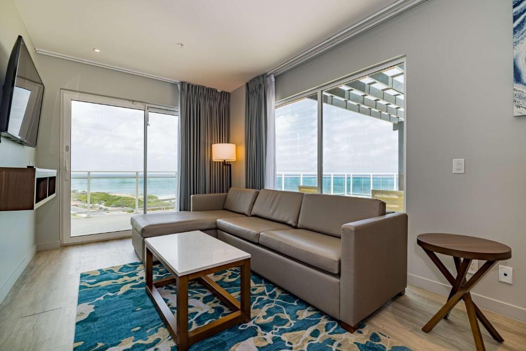 Embassy Suites Aruba Resort living room with ocean view
