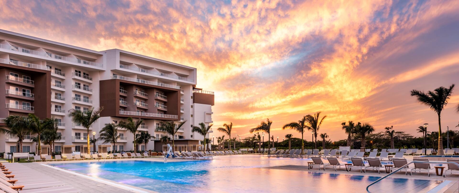 Embassy Suites Aruba Resort pool at sunset