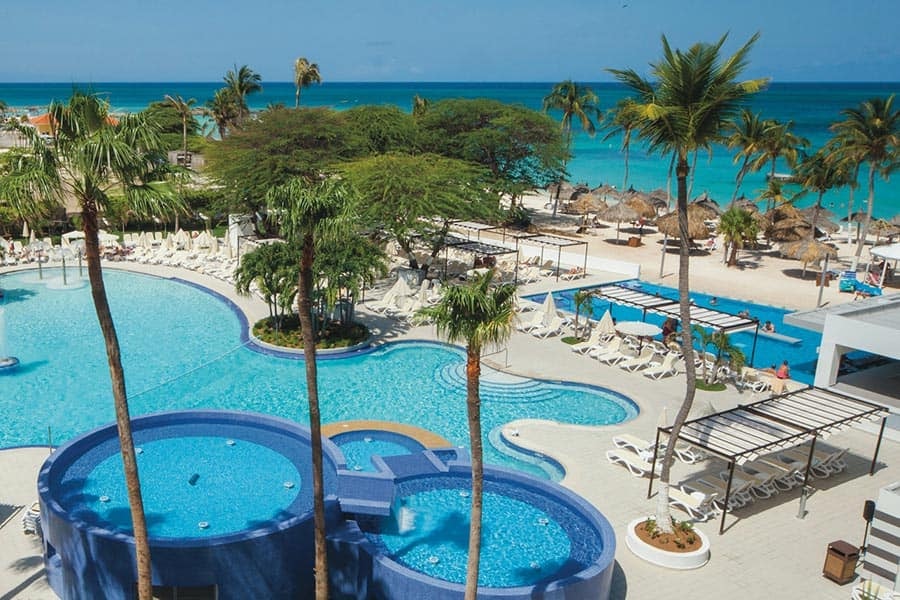 Resort pools with Caribbean ocean views